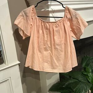 Peach colored linen off the shoulder blouses from Expeess